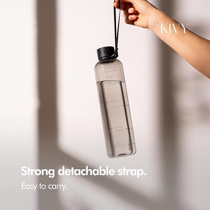 KIVY Slim Water Bottle 32oz [Lightweight & Shatterproof] Fits Backpack & Cupholder for Travel, Sports, School, Gym - Clear water bottle with measurements - Transparent Tritan Black - Dishwasher Safe-FlexoryFit