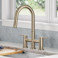 KRAUS Oletto Bridge Kitchen Faucet with Pull-Down Sprayhead in Spot-Free Antique Champagne Bronze, KPF-3122SFACB