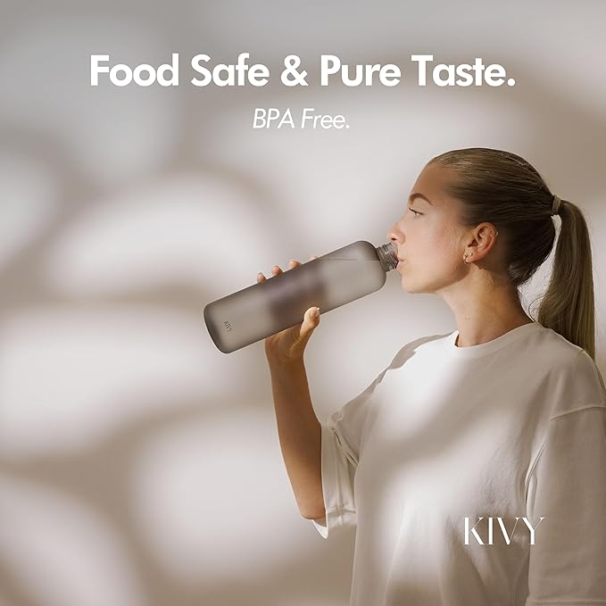 KIVY Slim Water Bottle 32oz [Lightweight & Shatterproof] Fits Backpack & Cupholder for Travel, Sports, School, Gym - Clear water bottle with measurements - Transparent Tritan Black - Dishwasher Safe-FlexoryFit