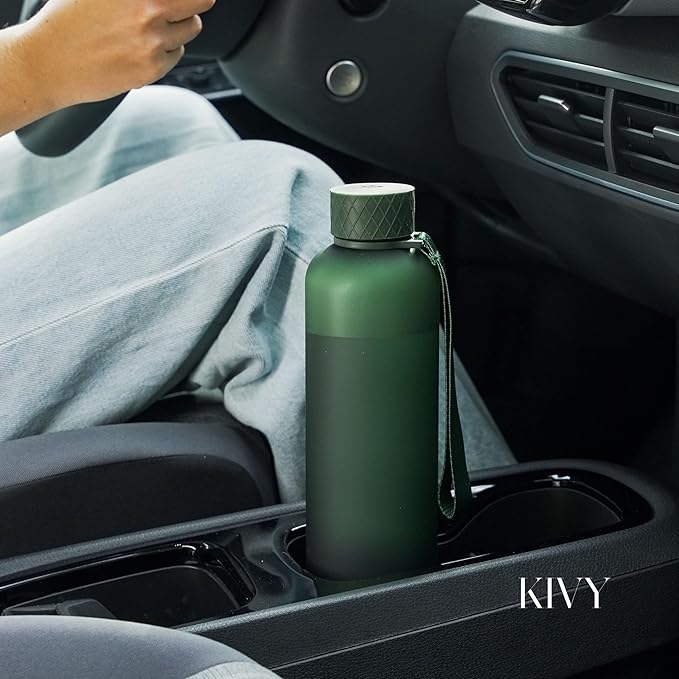 KIVY Slim Water Bottle 32oz [Lightweight & Shatterproof] Fits Cupholder & Backpack - Dishwasher safe water bottle no straw - Cute aesthetic water bottles screw top - Bpa free, Gold, White water bottle