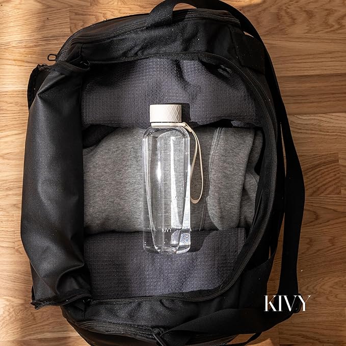 KIVY Slim Water Bottle 22oz [Lightweight & Shatterproof] - Small Drinking Waterbottle - Clear Water Bottle Without Straw for School, Sport & Travel - Transparent Bottle Dishwasher Safe, BPA Free-FlexoryFit